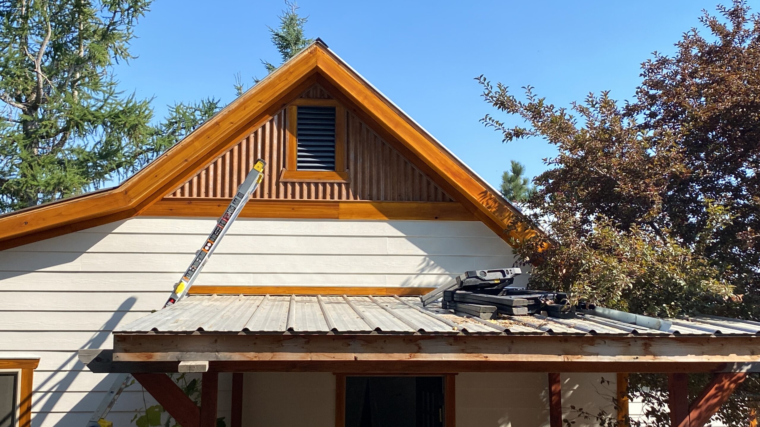 Gable end and porch roof of a house on a Jackson Renovation and Construction project